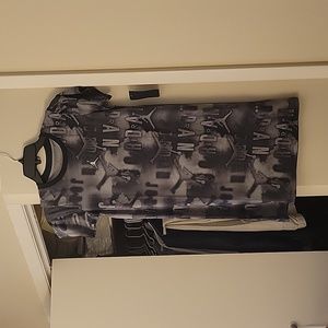 Jordan dress, girls size L. I wear a small womens, and it is roomy. Above knee